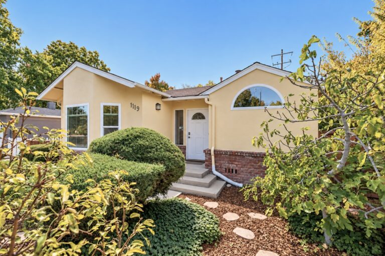 Sunny Suburban Home with Lush Landscaping (1)